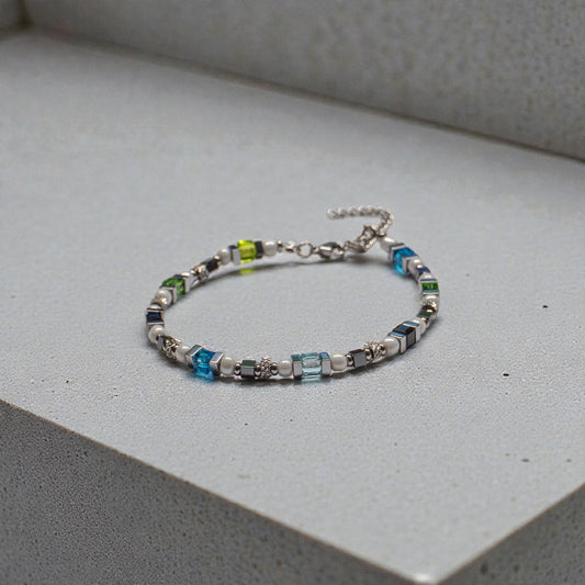 Sportlich-elegantes Armband aus Edelstahl Hämatit und Glaswürfeln